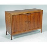 A WALNUT AND CROSSBANDED "HELIX" SIDEBOARD, David Booth for Gordon Russell Ltd., the two doors