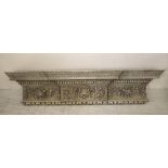 A GEORGIAN STYLE CARVED PINE MANTEL SHELF of breakfront form, the moulded edged shelf with leaf