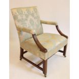 A GEORGIAN MAHOGANY LIBRARY CHAIR of "Gainsborough" type, upholstered in pale blue and gold silk