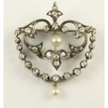 A VICTORIAN GIRANDOLE DIAMOND BROOCH, the open shield panel pave set with old brilliant cut stones