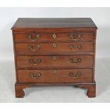 A GEORGE III MAHOGANY CHEST, 18th century, the moulded edged top over brushing slide and four