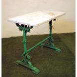 A VICTORIAN CAST IRON PUB TABLE, of rounded oblong form, the white marble top on pierced and