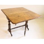 A VICTORIAN WALNUT SUTHERLAND TABLE of rounded oblong form, quarter veneered moulded edged top