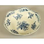 A FIRST PERIOD WORCESTER PORCELAIN JUNKET DISH, c.1770, of circular form with scalloped rim and