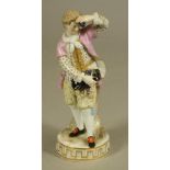 A MEISSEN PORCELAIN FIGURE, late 19th century, of an 18th century gallant, his left hand raised to