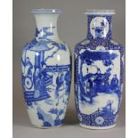 TWO CHINESE PORCELAIN VASES, 19th century, both painted in underglaze blue, one of rouleau form with