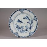 AN ENGLISH DELFT DISH, c.1760, probably Bristol, of plain circular form centrally painted in blue