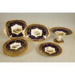 A COALPORT CHINA TOPOGRAPHICAL DESSERT SERVICE, c.1920's, with gadroon moulded borders, centrally
