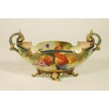 A ROYAL WORCESTER CHINA CENTRE BOWL, 1908, of oval pedestal form with two acanthus leaf sheathed