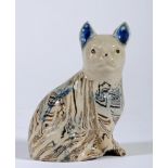 AN ENGLISH SOLID AGATE SLIP CAST CAT, mid 18th century, seated, with blue tinted pricked ears and
