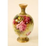 A ROYAL WORCESTER CHINA VASE, 1911, of ovoid form with waisted neck and a low foot, painted in