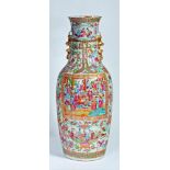 A CANTONESE PORCELAIN VASE, early 19th century, of pleat moulded slender baluster form with double