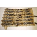 A COYOTE SKIN THROW, 20th century, comprising eighteen skins with twelve tails present and six masks