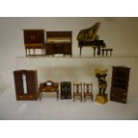 A collection of dolls house furniture comprising chinoiserie grand piano and stool by Daew Smith,
