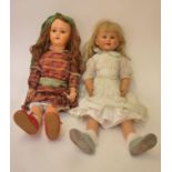 A large Simon & Halbig all composition doll with brown glass sleeping eyes, open mouth and teeth,