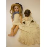 A German bisque head doll with brown glass sleeping eyes, open mouth and teeth, blonde mohair wig,