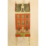 A Continental dolls house or cabinet by Eric Lansdown of San Francisco, painted wood construction