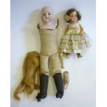 A J. Walther & Sohn bisque head doll with brown glass sleeping eyes, open mouth and teeth, brown