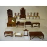 A collection of Glenowen dolls house furniture in mahogany finish comprising dining table, set of