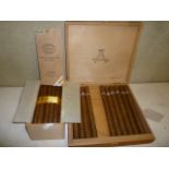 Twenty three Montecristo "A" cigars (9 1/4"), in opened box (Cuba), and twenty five Partagas Habanos