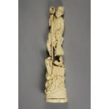 A JAPANESE ONE PIECE IVORY OKIMONO, Meiji period, of a fisherman holding a long net/spear in his