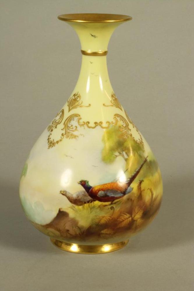 A ROYAL WORCESTER "HADLEY WARE" VASE, 1905, of onion form painted in polychrome enamels with a brace