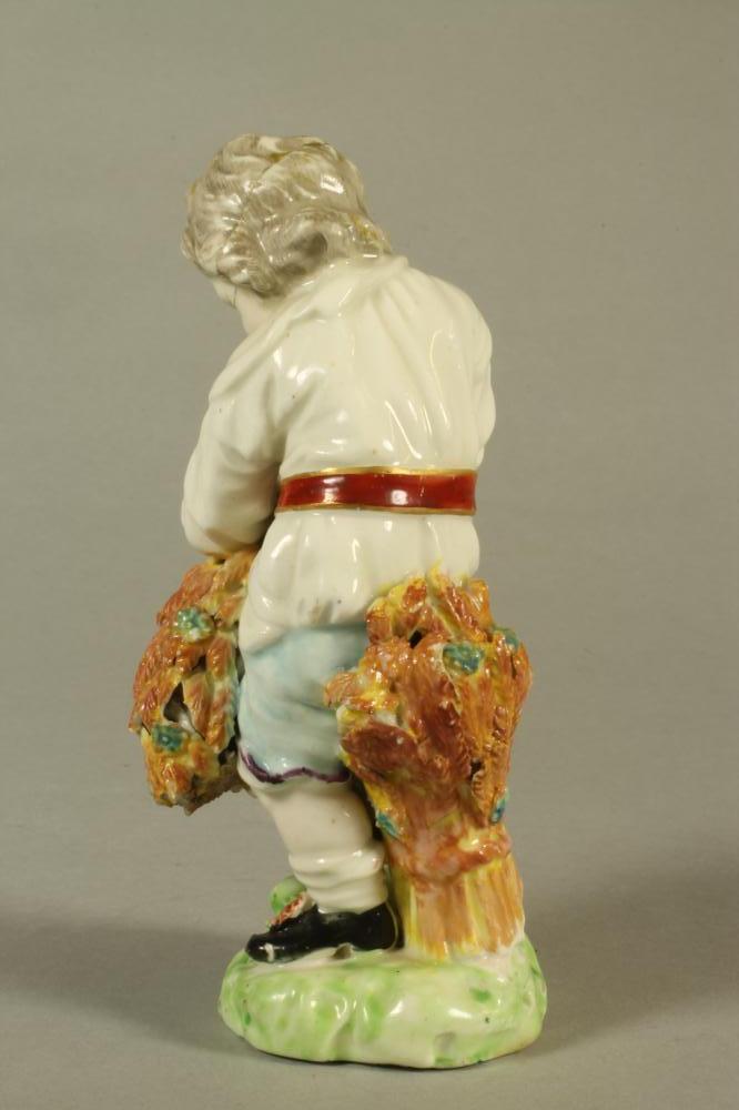 A DERBY PORCELAIN FIGURE, c.1770, allegorical of Autumn modelled as a young boy wearing a white open - Image 2 of 4