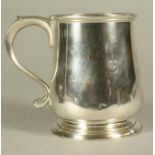 AN EARLY VICTORIAN SILVER MUG, maker Charles Fox, London 1839, of plain baluster form engraved "