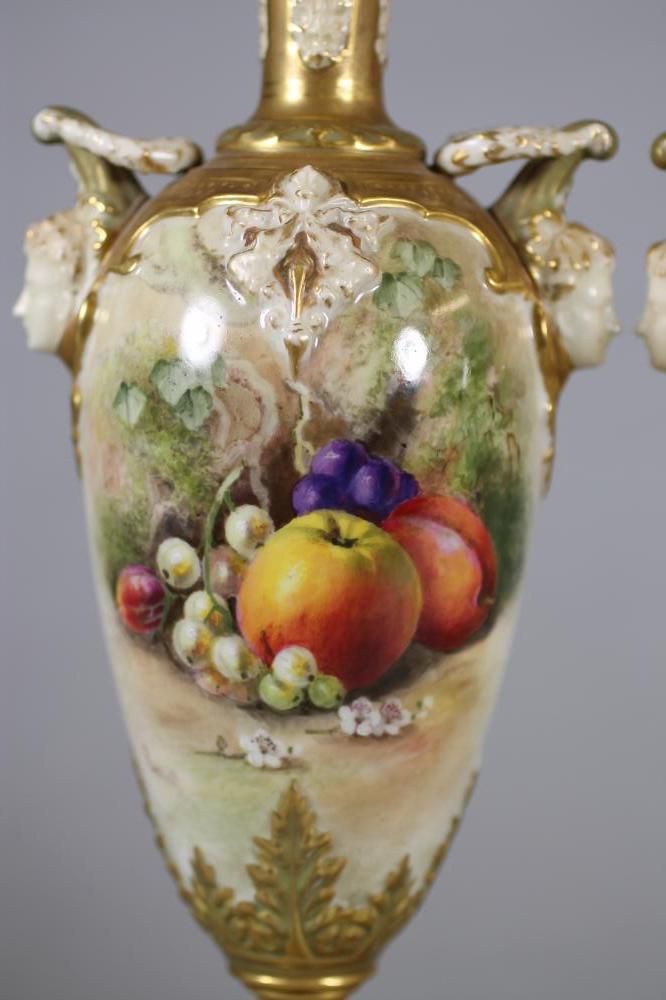 A MATCHED PAIR OF ROYAL WORCESTER CHINA VASES, 1912 and 1913, of slender ovoid form with arcade - Image 2 of 6