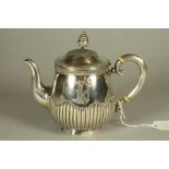 A RUSSIAN SILVER TEAPOT, 1907-1918, sponsor PL, district AP, of semi fluted rounded tapering