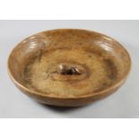 A ROBERT THOMPSON ADZED OAK FRUIT BOWL, of shallow circular form with central carved mouse trademark