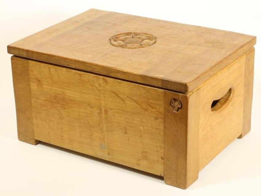 A MALCOLM PIPES ADZED OAK BOX of oblong form, the hinged lid centred by a carved Yorkshire Rose,