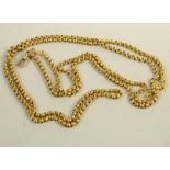 A 9CT GOLD FACET LINK GUARD CHAIN, with dog clip fastener stamped 9ct, 50" long, 34g