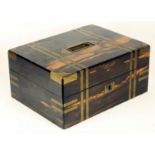 AN EARLY VICTORIAN COROMANDEL TRAVELLING DRESSING BOX of plain oblong form with inlaid brass, the