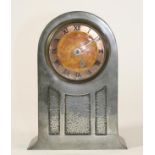 A LIBERTY & CO. "TUDRIC" PEWTER MANTEL CLOCK, the French spring movement with 3 1/4" dial, copper