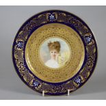 A VIENNA PORCELAIN CABINET PLATE, late 19th century, of plain circular form, centrally painted in