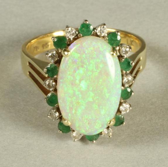 AN OPAL, EMERALD AND DIAMOND COCKTAIL RING/PENDANT, the oval cabochon polished opal claw set to an - Bild 2 aus 3