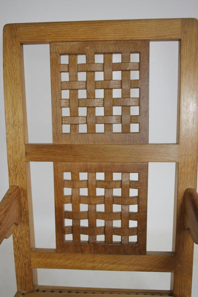 A ROBERT THOMPSON OAK ROCKING CHAIR, the tapering back with straight top rail over two pierced - Image 2 of 3