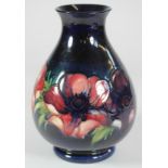 A MOORCROFT POTTERY VASE, mid 20th century, of ovoid form with waisted neck, tubelined and painted