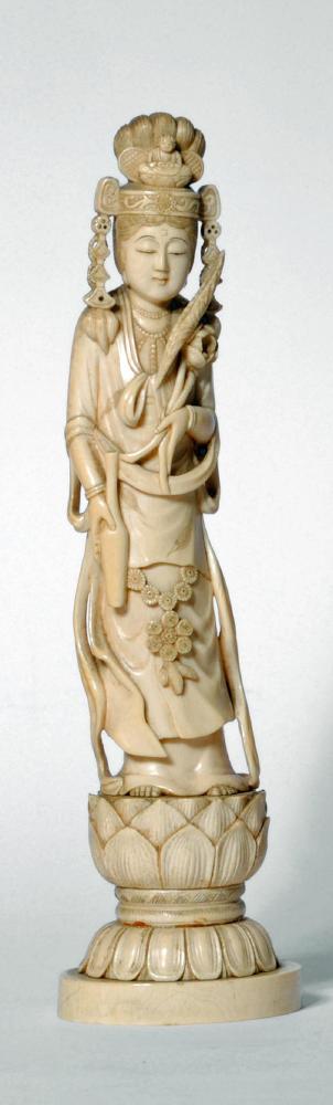 A JAPANESE ONE PIECE IVORY OKIMONO, Meiji period, of a Bejin with high elaborate hair style with