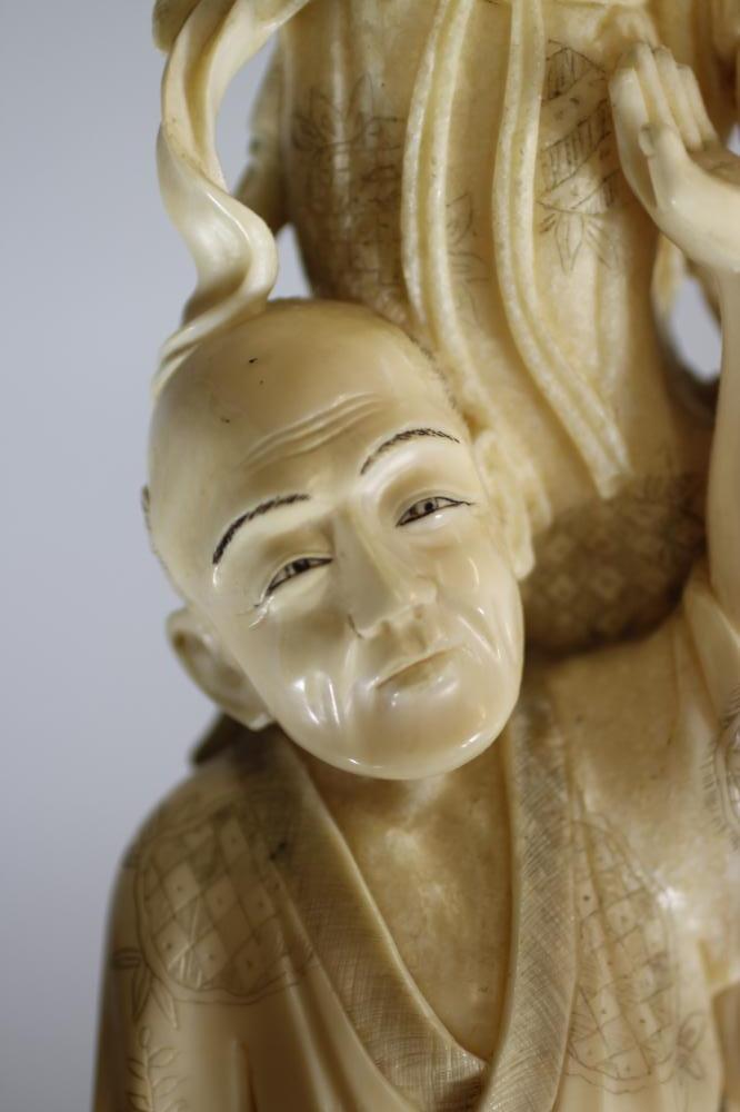 A JAPANESE ONE PIECE IVORY OKIMONO, Meiji period, of a fisherman supporting a young child standing - Image 6 of 8