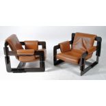 A PAIR OF ARNE JACOBSEN ROVER ARMCHAIRS in stained and laminated beech, of open sectional form