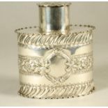 A LATE VICTORIAN SILVER TEA CANISTER, maker G M Jackson, London 1895, of oval form with lift-off