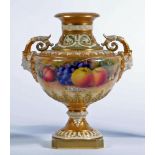 A ROYAL WORCESTER CHINA VASE, 1913, of squat baluster form with stiff leaf and scroll moulded