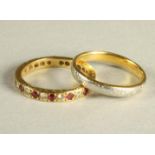 A PLATINUM AND 22CT GOLD BI-COLOUR WEDDING RING chased with scrolls, 3.4g gross, size N, together