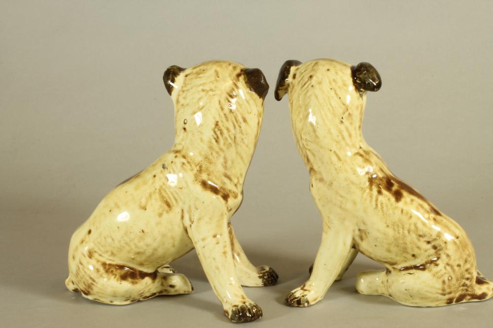 A MATCHED PAIR OF CONTINENTAL CREAMWARE SLIP CAST MODELS OF PUGS, c.1900, seated with free - Image 2 of 5