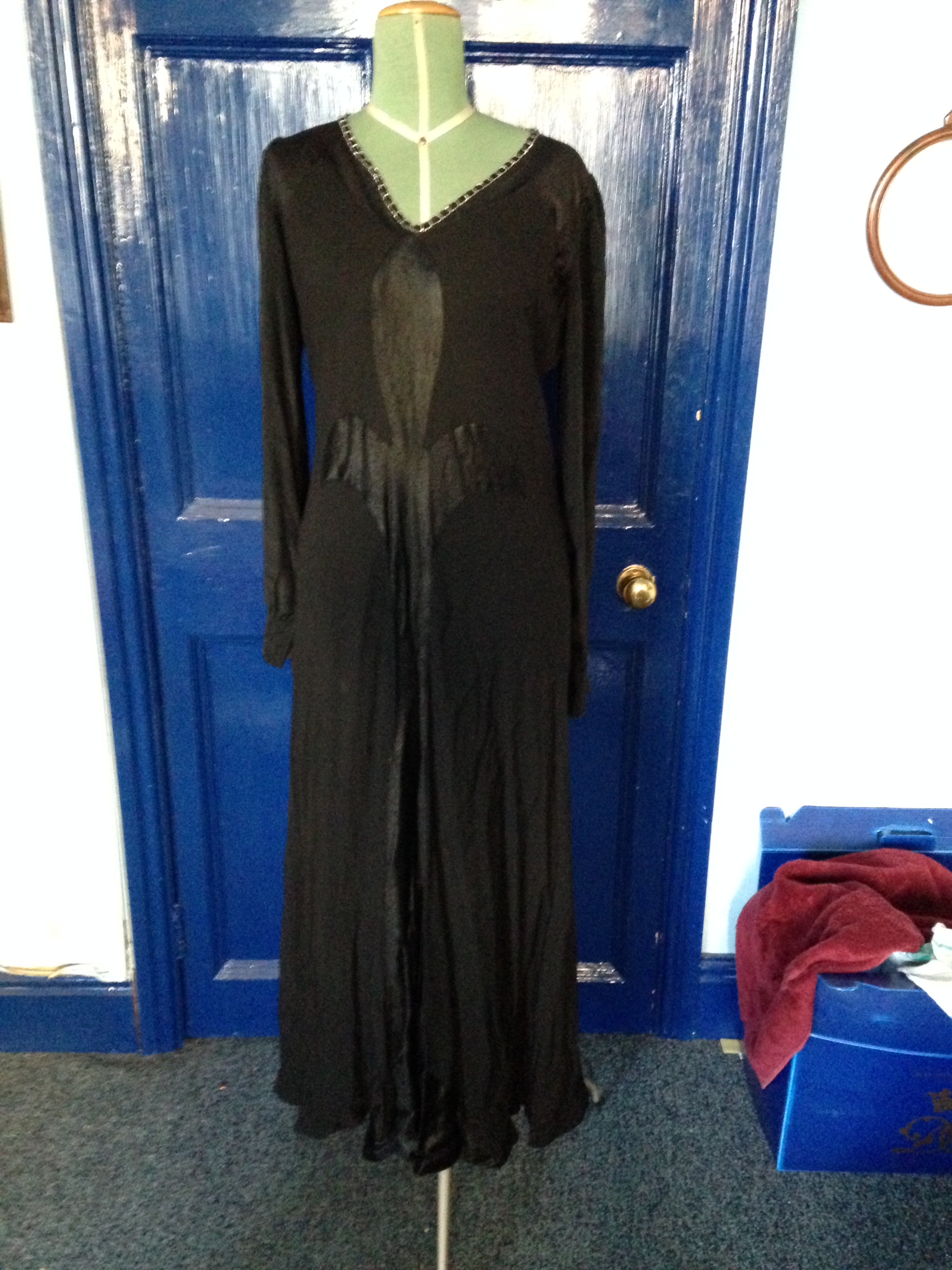 A 1930'S black evening gown