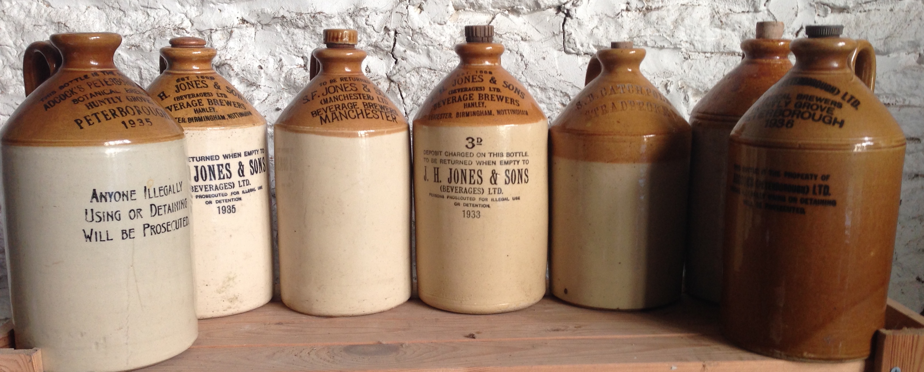 Seven various stoneware jars