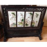 Good quality Chinese hardwood screen with four finely painted porcelain panels