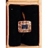 An 18ct and platignum diamond and sapphire dress ring